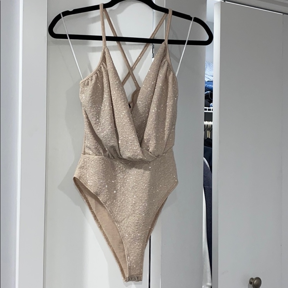 Gold sparkle body suit